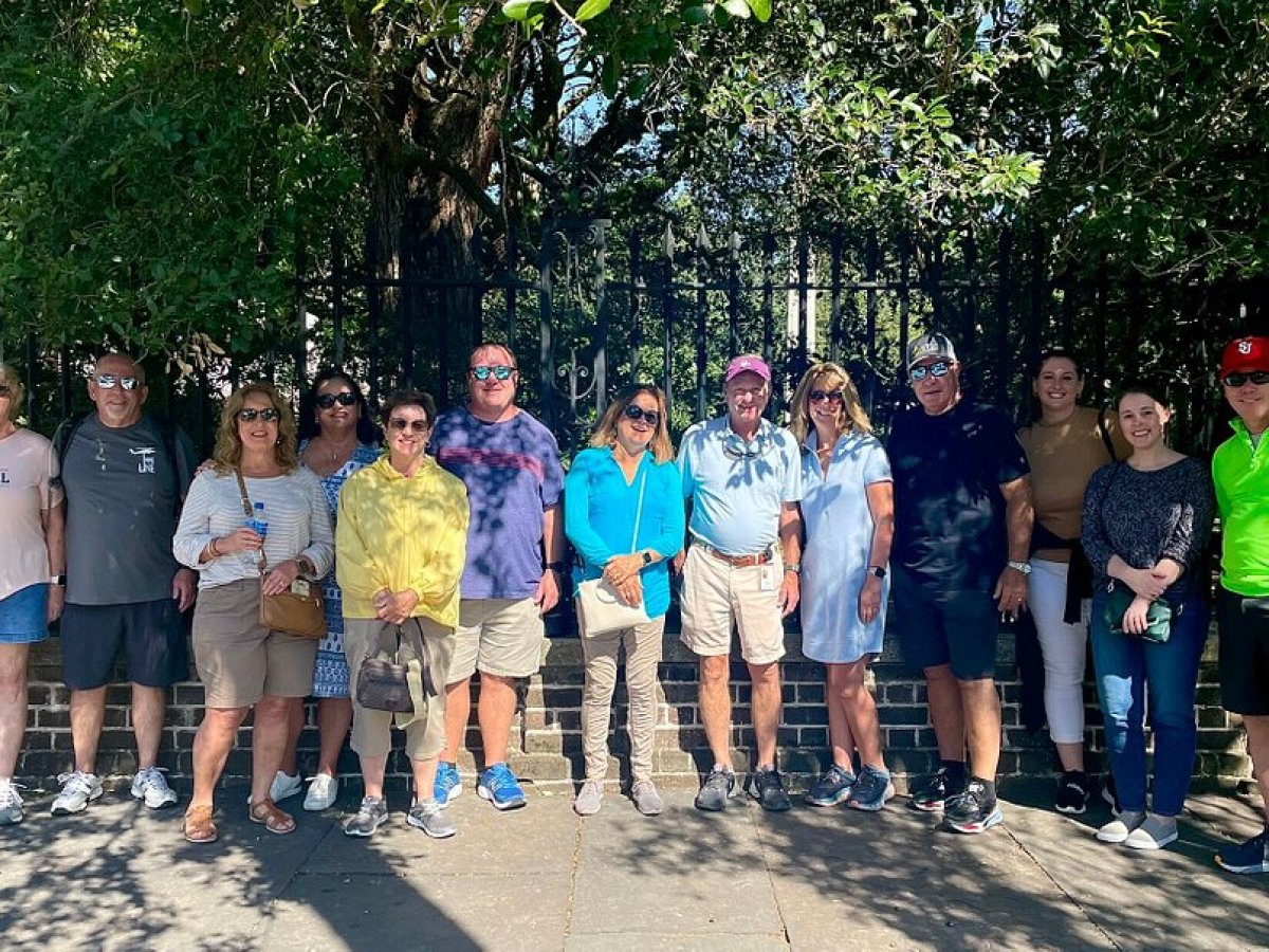 a group of people posing for the camera