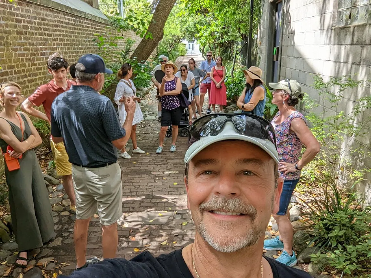 a group of people standing in front of a crowd