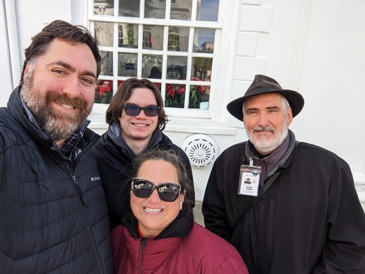 a group of people posing for the camera