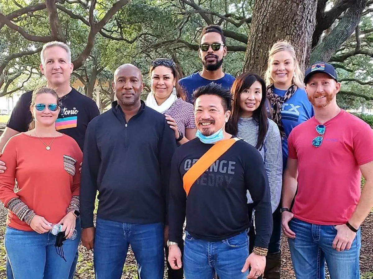 a group of people posing for a photo