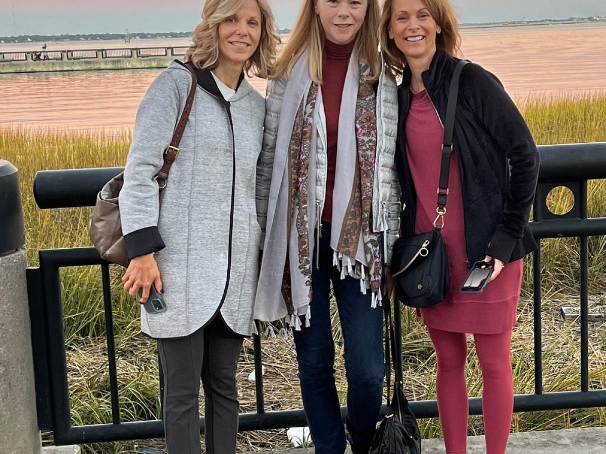 a group of people posing for the camera