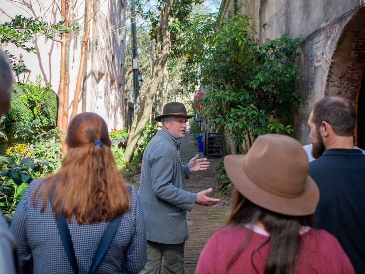 a group of people standing in front of a building