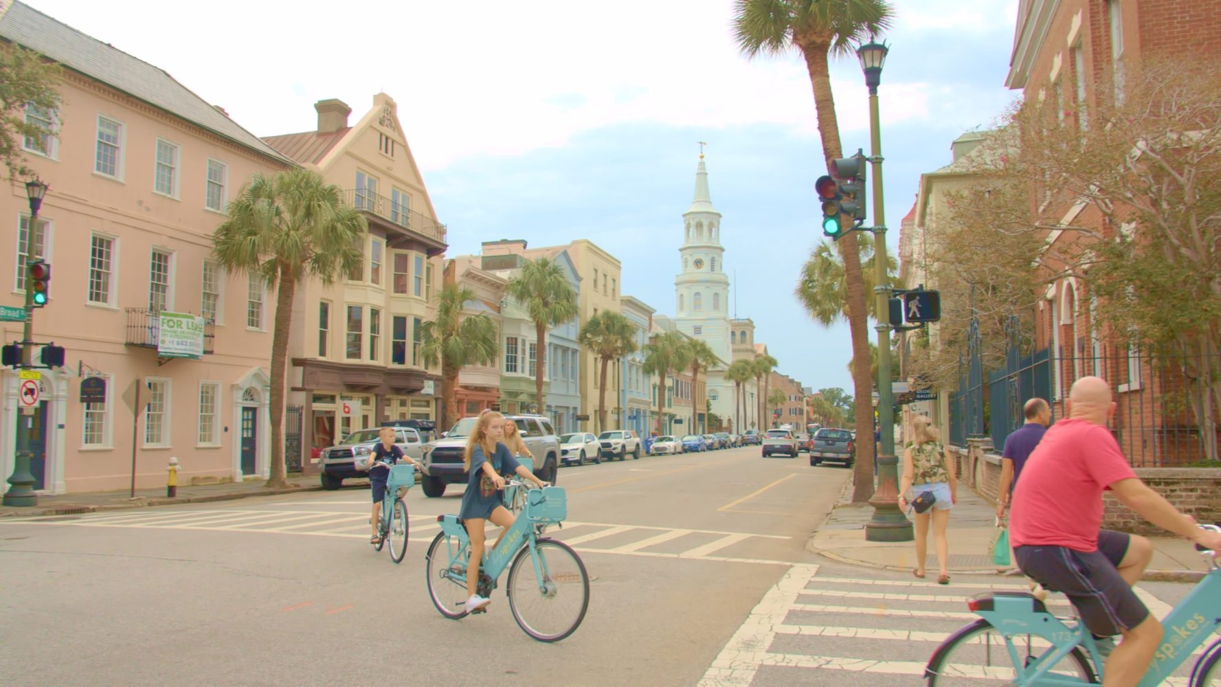 a person riding a bicycle on a city street